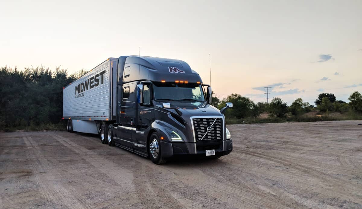 Midwest Carriers truck parked in a gravel lot
